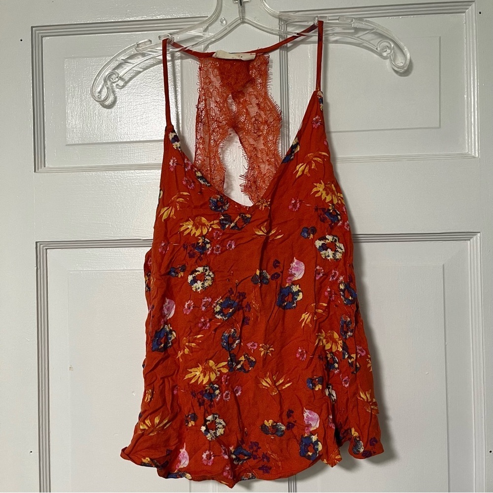 Elodie vibrant orange base with a multicolored floral print Lace Cami Top